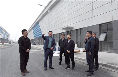 覃振華到江蘇、安徽兩地調研市場經營